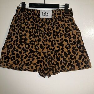 Dressed in LALA boxer shorts, size Medium. Women's Leopard Print Shorts